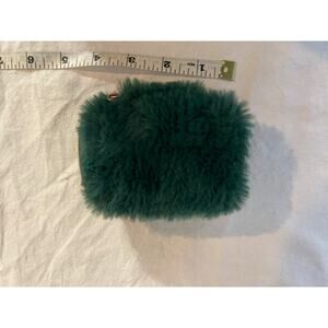 Green fluffy earbud holder